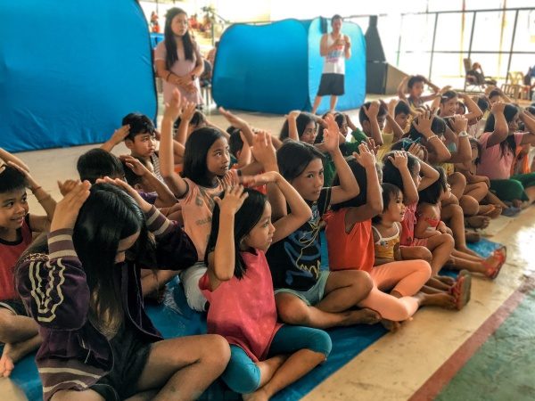 LEARNING IS FUN. Kids at an evacuation center in Alitagtag, Batangas, join the learning activity initiated by a group of youth volunteers on January 16, 2020. Photo by Nikko Leoven Pagsuyoin  