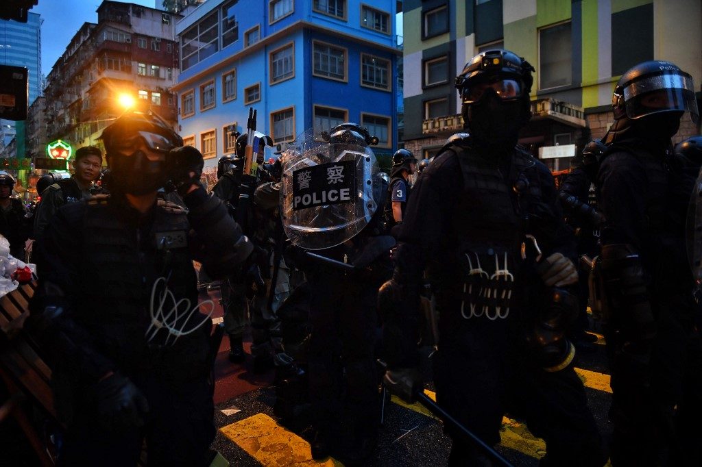Hong Kong police ban mass protest over safety fears