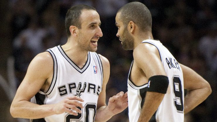 International players, like Spurs teammates Manu Ginobili (L) and Tony Parker (R) are often asked to carry the large burden of their teams. Photo by Ashley Landis/EPA