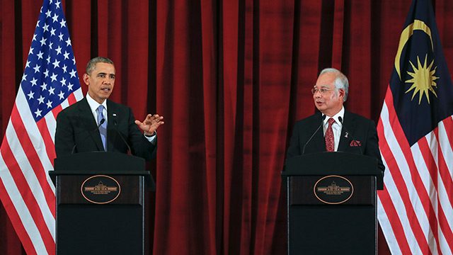 Obama courts Malaysia while nudging on rights