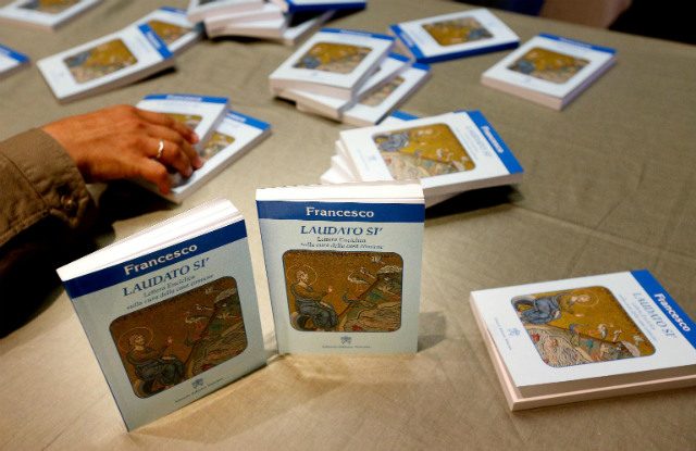 PAPAL LETTER. The Vatican presents copies of Pope Francis's encyclical on the environment, titled 'Laudato Si,' its official presentation in Vatican City on June 18, 2015. Photo by Alessandro di Meo/EPA 