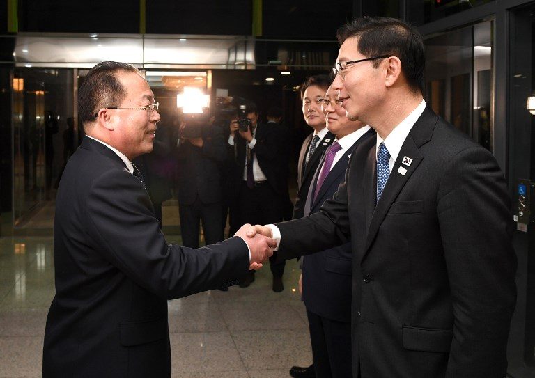 Two Koreas agree to march together at Winter Olympics opening