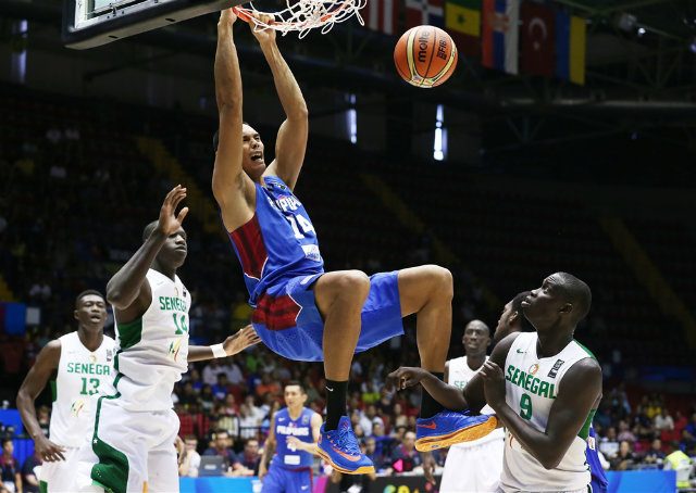 Japeth Aguilar throws down a two-handed dunk. Photo from FIBA.com