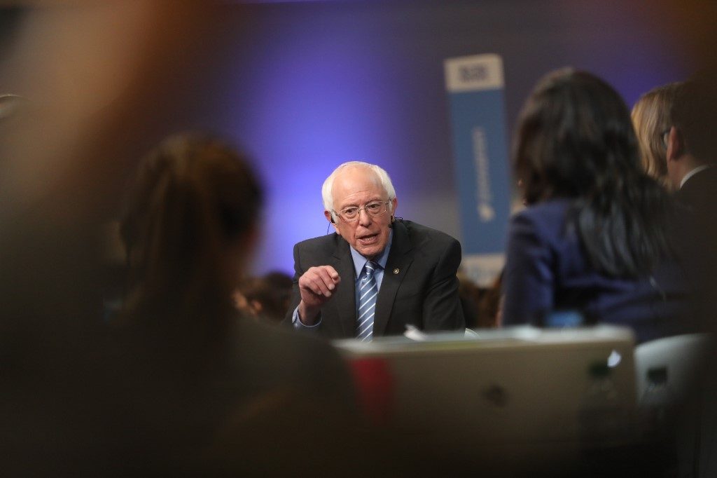 Sanders roughed up, hits back at Democratic presidential debate