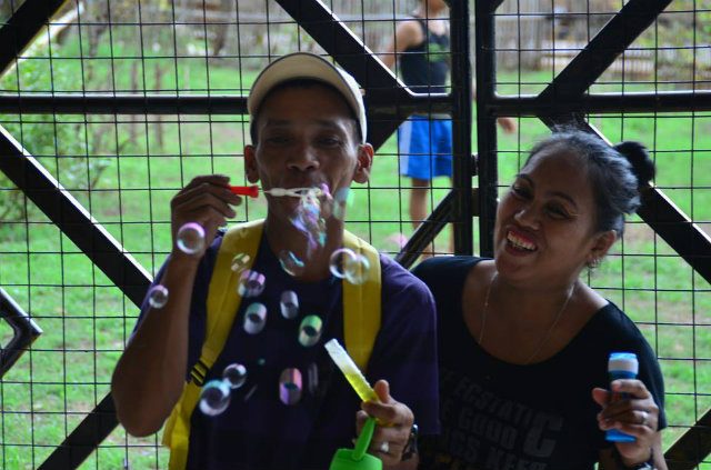 HAPPINESS FOR ALL AGES. Parents share a smile and join their children in spreading joy during the Global Bubble Parade at Xavier Ecoville. Photo by Jan Michael Amper 