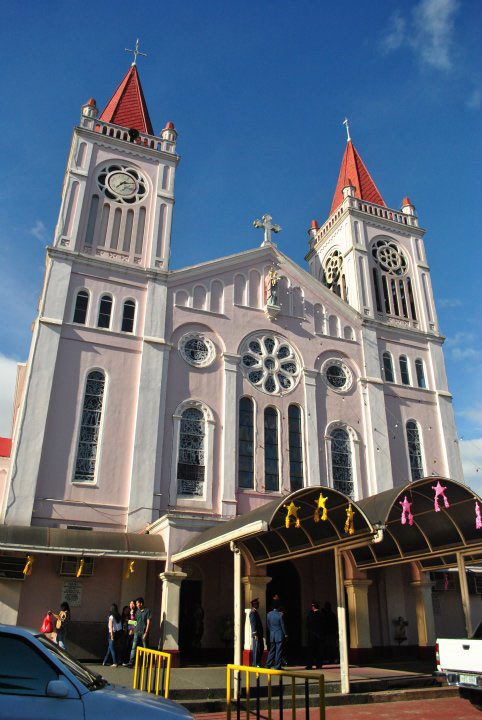 BAGUIO CATHEDRAL. A popular destination, the church is also well-known by the unique color of the top the two towers on both sides. Photo by Che Gurrobat