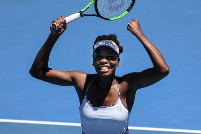 Venus Williams of the US celebrates her victory against Russia's Anastasia Pavlyuchenkova during their women's singles quarterfinal match on day 9 of the Australian Open tennis tournament in Melbourne on January 24, 2017.  SAEED KHAN / AFP 