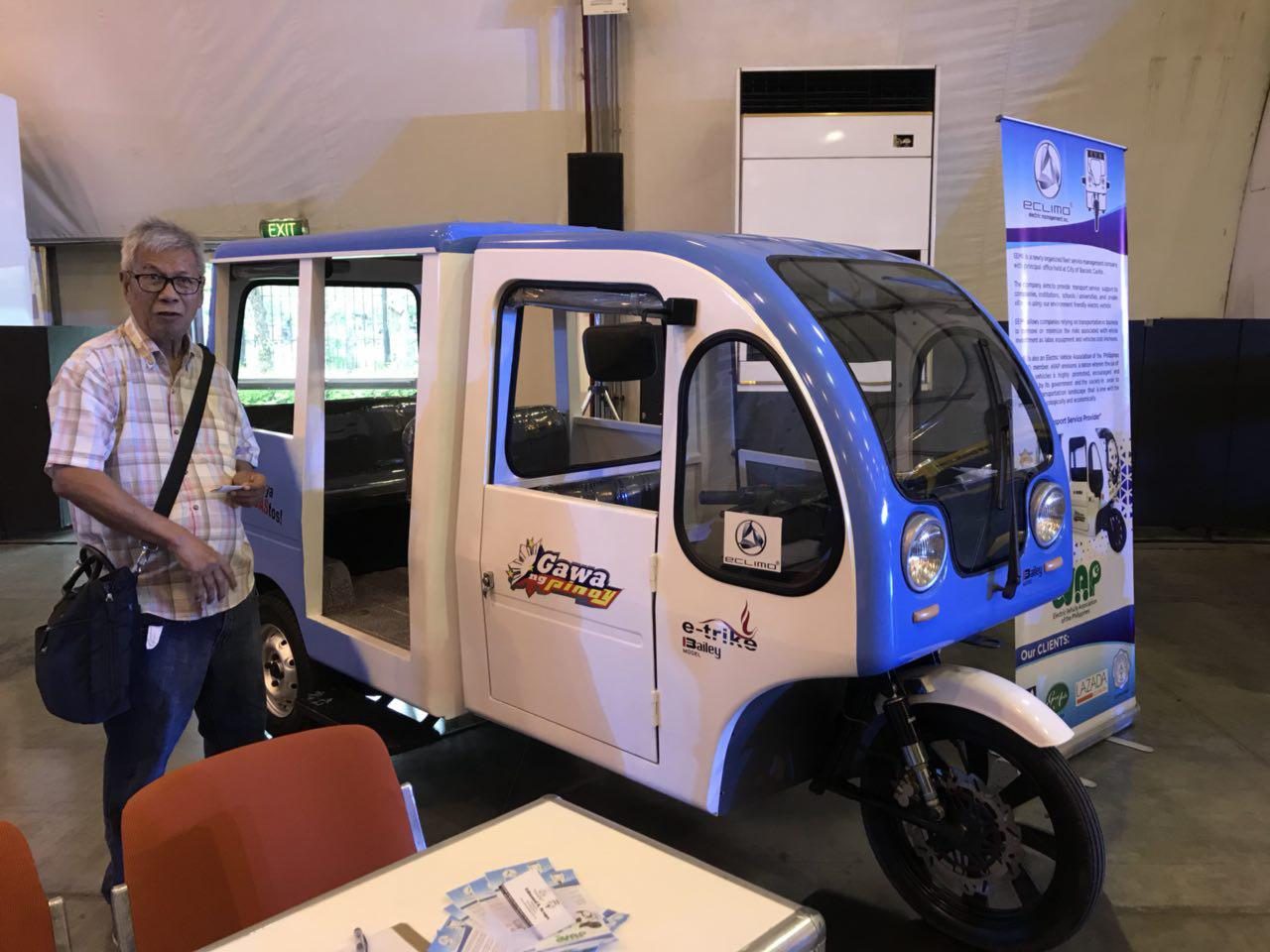ELECTRIC. Eclimo Motors showcases a battery-powered tricycle at the expo. 