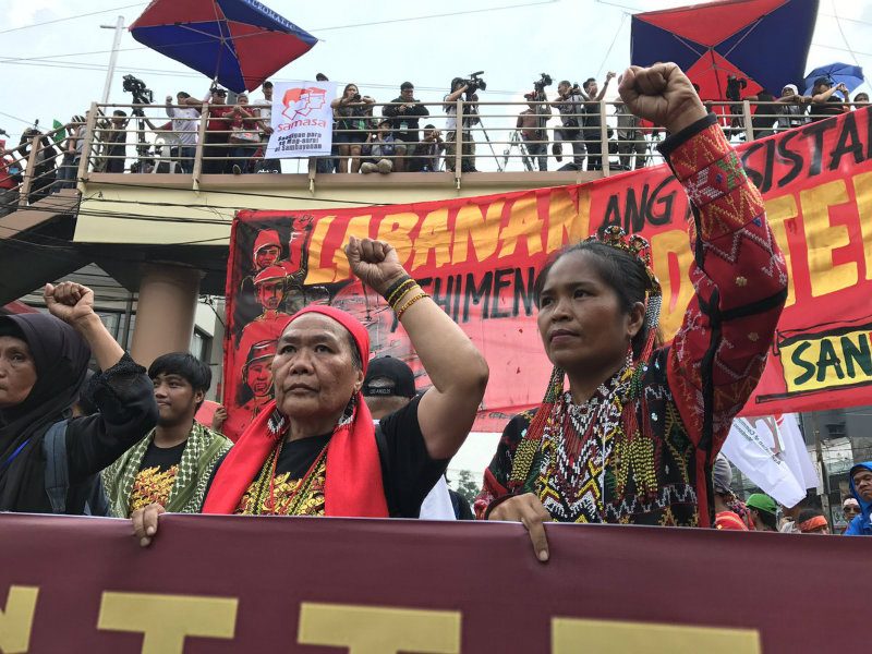 Indigenous peoples march to ask Duterte to lift martial law in Mindanao
