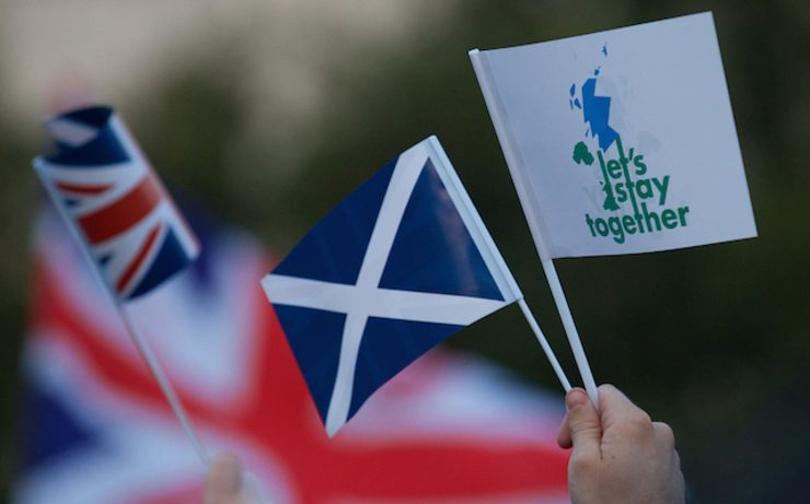 'LET'S STAY TOGETHER' People wave national flags as they gather for a rally in favor of Scotland staying in the UK in the upcoming referendum, in Trafalgar Square, London, England, 15 September 2014. Andrew Cowie/EPA