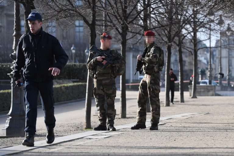French investigators grill suspect in Louvre attack