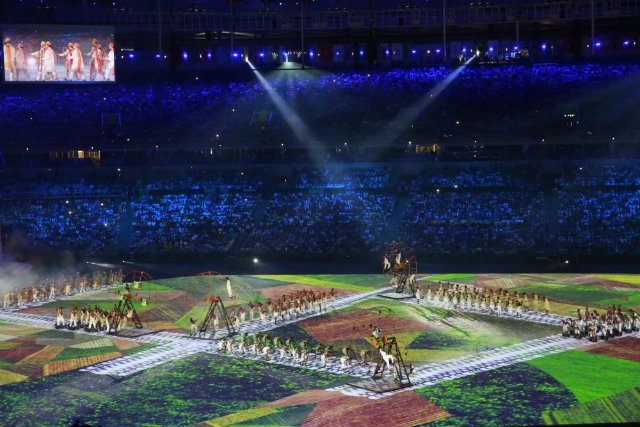 Artists perform during the Opening Ceremony of the Rio 2016 Olympic Games at the Maracana Stadium in Rio de Janeiro, Brazil. Photo by Tatyana Zenkovich/EPA 