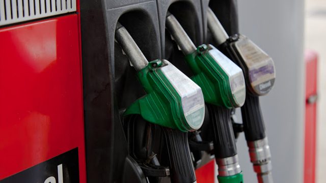 Oil firms roll back prices