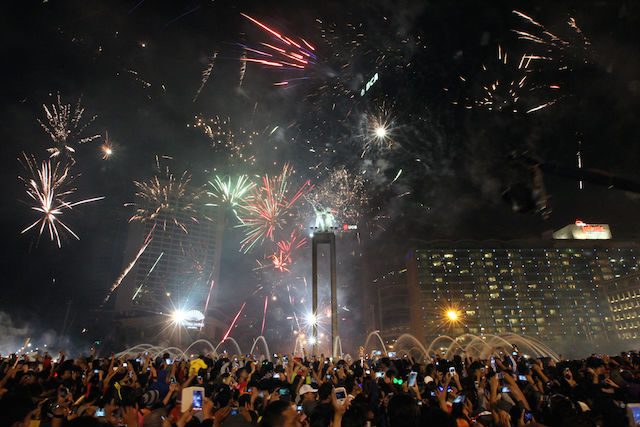 The scene at Jakarta’s Hotel Indonesia traffic circle during the New Year celebration in 2013. Photo by EPA