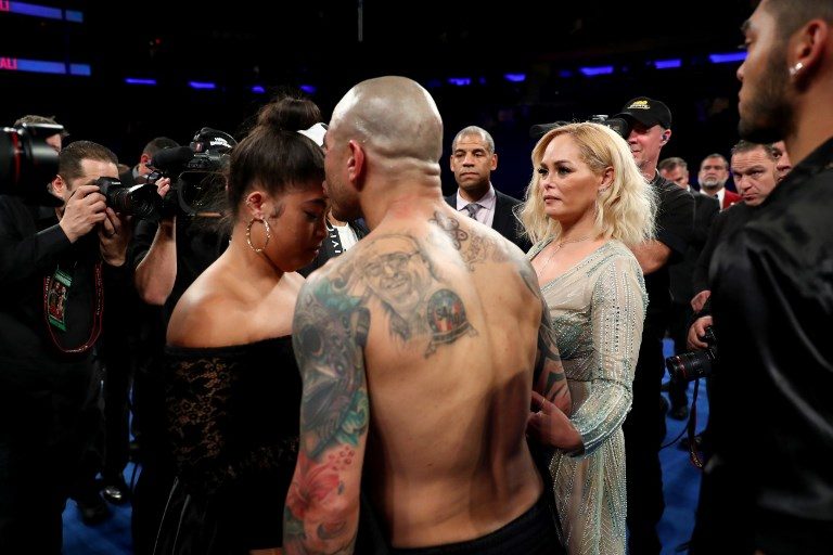 CHAMP'S FAMILY. Miguel Cotto kisses his daughter Alondra Cotto after losing his last junior middleweight bout against Sadam Ali at Madison Square Garden on December 02, 2017 in New York City. Photo by Al Bello/Getty Images/AFP 