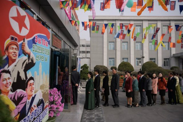 RUBBER STAMP. North Korean voters queue to cast their ballots during voting for the Supreme People's Assembly elections in Pyongyang on March 10, 2019. Photo by Ed Jones/AFP  