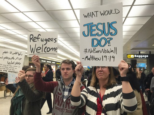 OPPOSING REFUGEE BAN. 'Jesus was a refugee,' protester Sarah Crisman says at the Washington Dulles International Airport on January 28, 2017. Photo by Paterno Esmaquel II/Rappler 