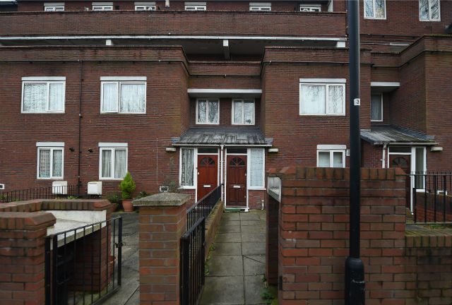 JIHADI JOHN'S HOME. An exterior view of a home (R) believed to be where IS militant 'Jihadi John', identified as Mohammed Emwazi, used to live in London. Photo by Andy Rain/EPA  