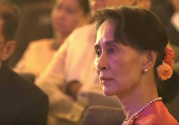 GUEST. Myanmar State Counselor Aung San Suu Kyi looks on as former Philippine president Gloria Macapagal Arroyo makes her speech.  