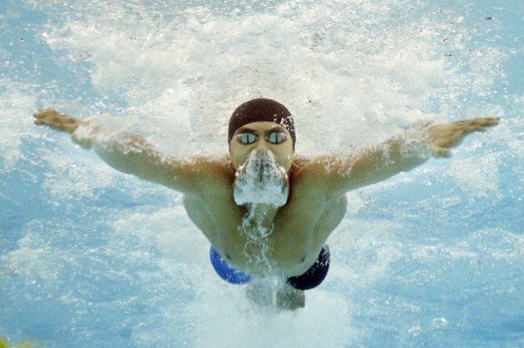 CHASING MEDALS. Indonesia's Glenn Victor Sutanto competes in the men's 100m butterfly swimming event during the 17th Asian Games in Incheon on September 24, 2014. Photo by AFP