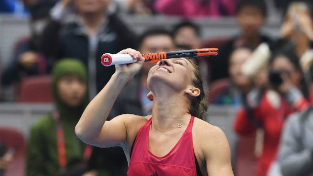 Halep battles into Aussie Open final with Wozniacki