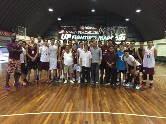 WITH THE TEAM. Bo Perasol is welcome by the UP Fighting Maroons. Photo from Melmac Sports  