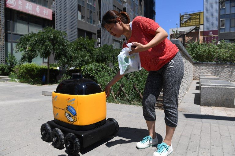 Yellow robots deliver snacks to homes in China