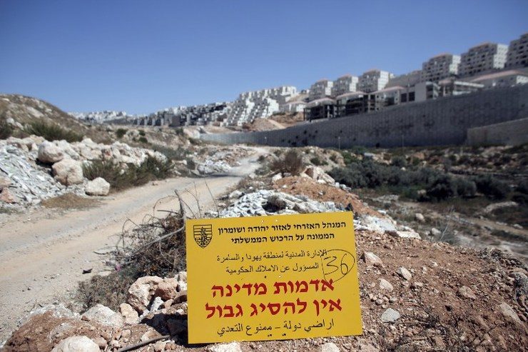 Palestinians urge UN to demand Israel end settlements