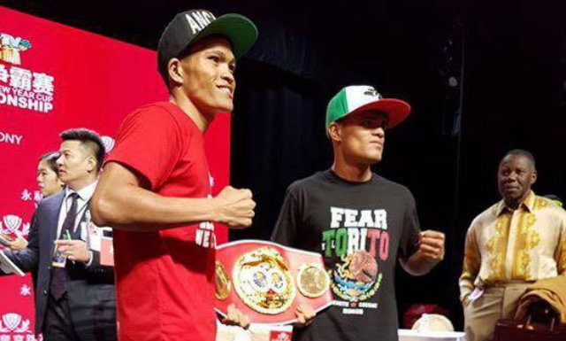 FIRST DEFENSE. Jerwin Ancajas wasn't intimidated by Jose Alfredo Rodriguez's attempts to get inside his head, says trainer Joven Jimenez. Photo from Team Ancajas 