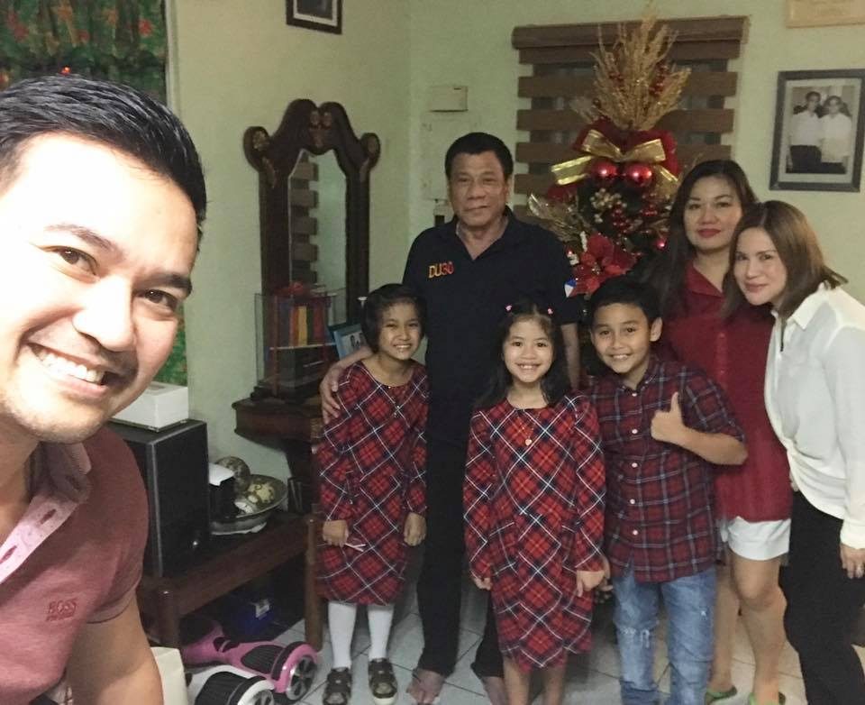 CHRISTMAS GUESTS. The President and his common-law wife Honeylet with the Rep Velasco's family. Photo courtesy of Rep Lord Allan Velasco    