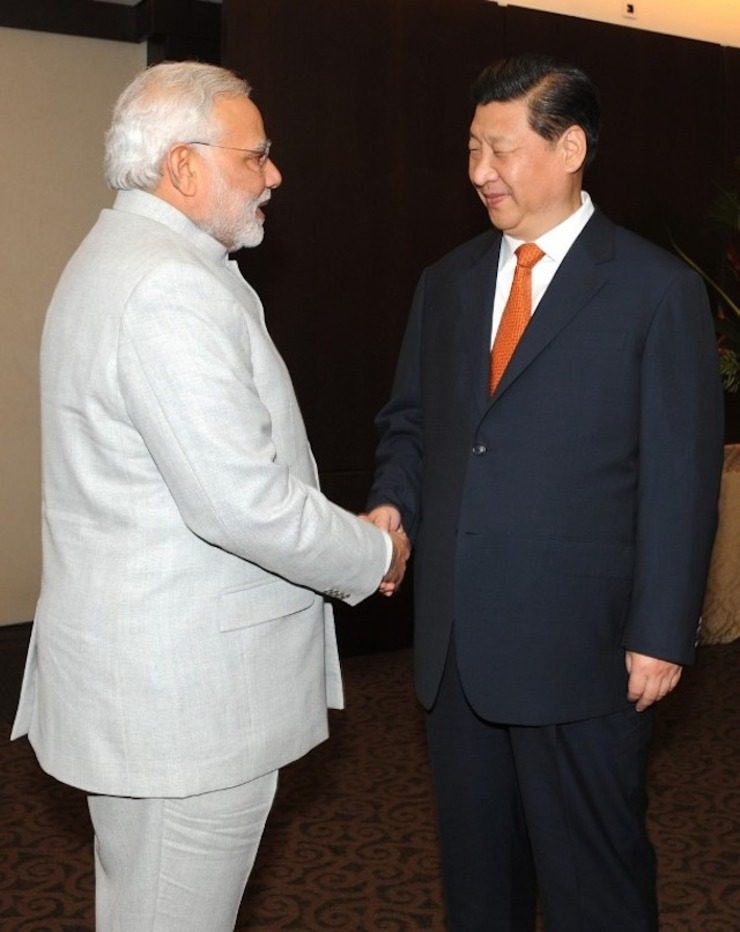 China’s Xi visits India, sets tone for future relations