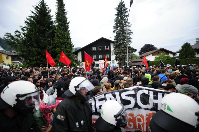 Heavy police presence for G7 as protesters stage colorful demos