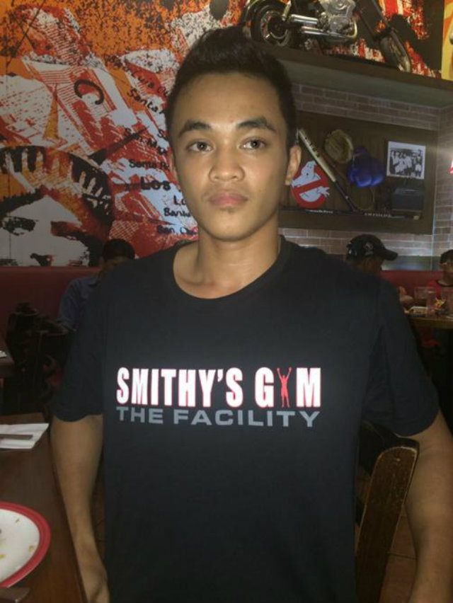 John Vincent Moralde wears a shirt from Braydon Smith's Gym upon his return to the Philippines. Photo by Ryan Songalia 