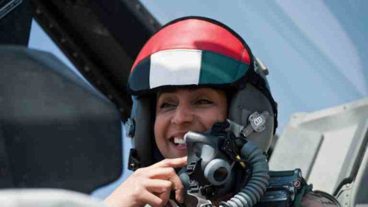 STRIKES. Major Mariam al-Mansouri, the first female pilot to join the Emirates Air Forces, gesturing as she sits in the cockpit of her F-16 fighter jet. Mansouri. AFP PHOTO