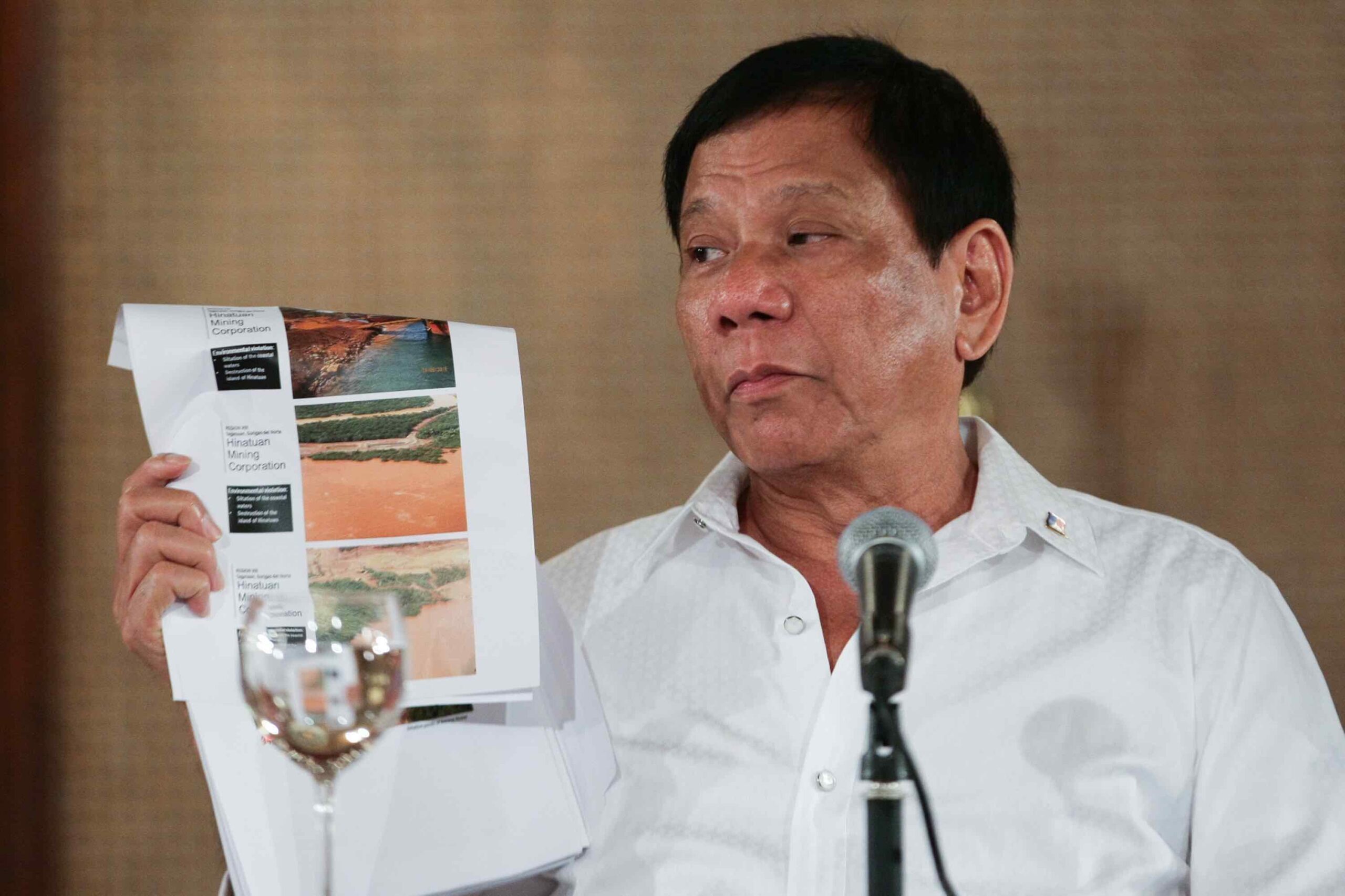 Duterte eyes total mining ban, backs embattled Lopez