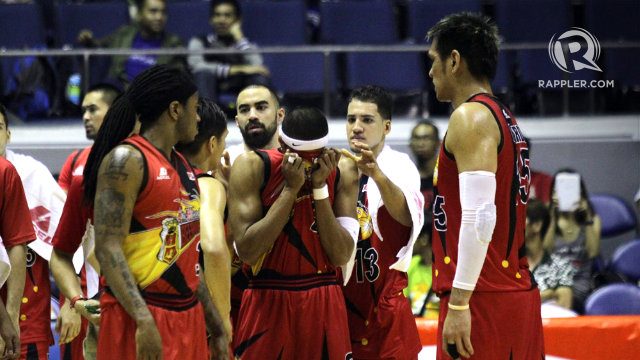 San Miguel Beer players try to comfort a visibly distraught Arwind Santos after his mother was stretchered off the court in March 2015. File Photo by Josh Albelda/Rappler  