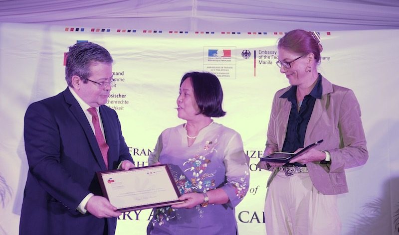 AWARDEE/ Advocate for the disappeared Aileen Bacalso being awarded the Franco-German Ministerial Prize for Human Rights by French Ambassador Nicolas Galey and German Ambassador Anke Reiffenstuel at the Embassy of France on Dec 12, 2019. 