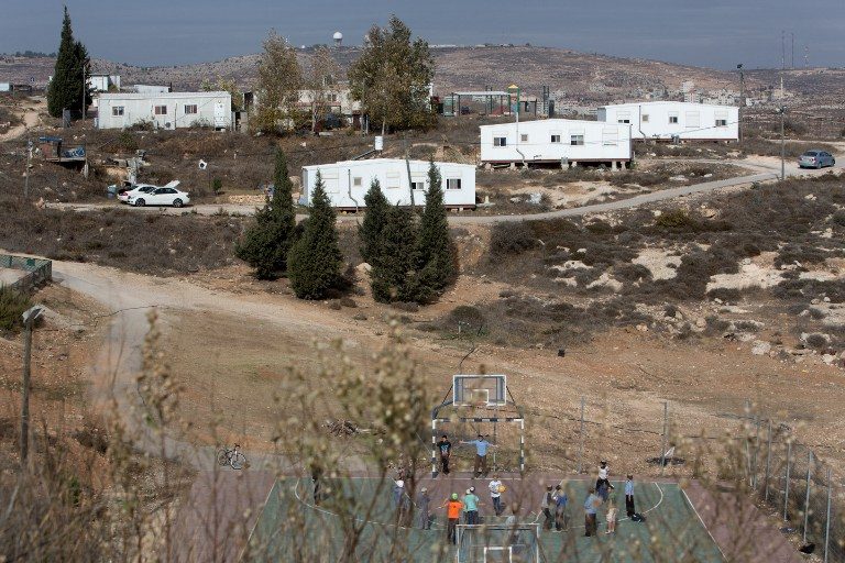 UN demands end to Israeli settlements after U.S. abstains