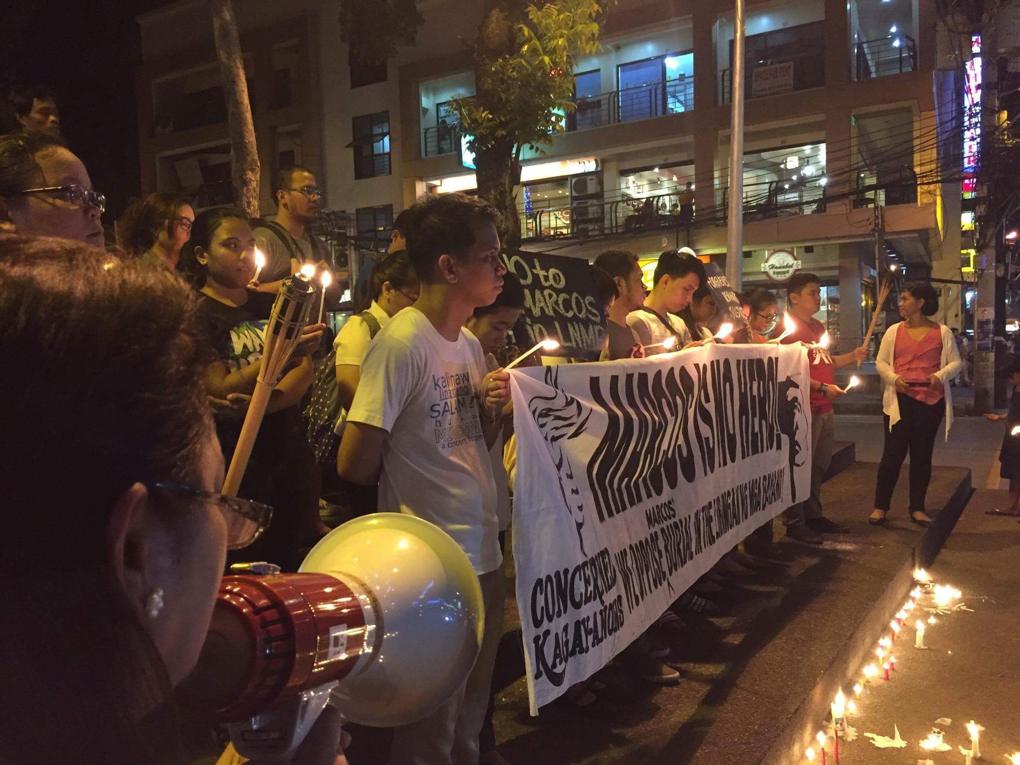 HEAR MINDANAO. Residents in Cagayan de Oro held a candle light rally in historic Plaza Divisoria denouncing the Supreme Court decision allowing the burial of late dictator Ferdinand Marcos. Photo courtesy of Cong Corrales. 