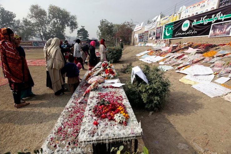 Pakistanis pray, resolve to fight terror at stricken school