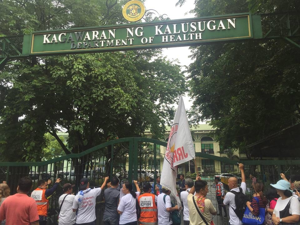 BETTER HEALTHCARE. Protesters bang the gates of the Department of Health to voice their concerns, including the privatization of public hospitals 