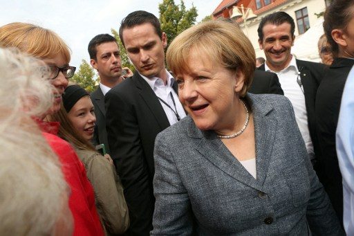 Germany’s anti-migrant populists beat Merkel’s party in local vote