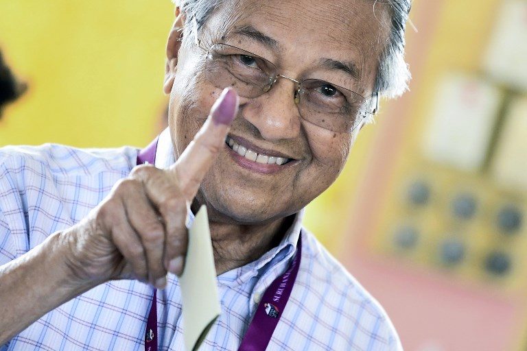 Malaysia’s opposition makes strong early gains – unofficial tallies