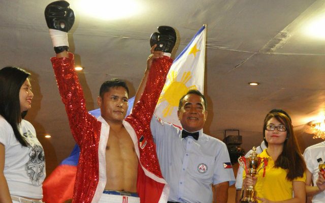 Pinoy boxer Dennis Laurente loses one-sided decision to John Jackson