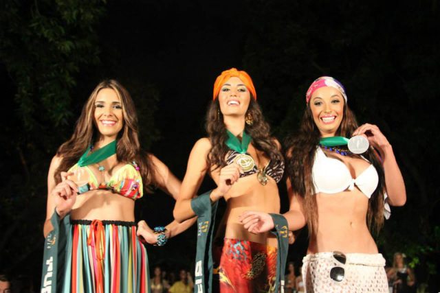 GROUP 1 RESORT WEAR. Puerto Rico's Franceska Toro, Spain's Zaira Bas and Bolivia's Eloísa Gutiérrez  during the group's resort wear competition. Photo courtesy of Miss Earth