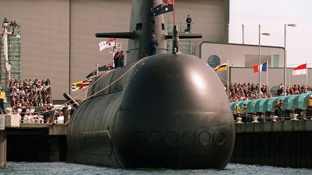 Japan, Australia talk closer military ties and submarines