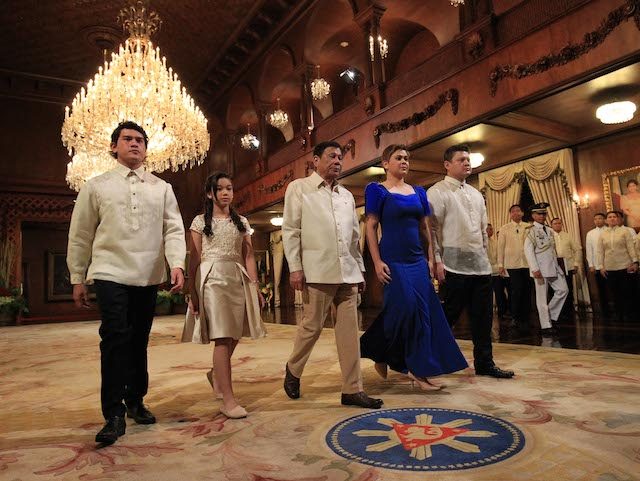 THE PRESIDENT AND HIS CHILDREN. President Rodrigo Duterte heads to the Palace Rizal Hall for his oath taking, flanked by his children. Photo from EDP-Malacanang 