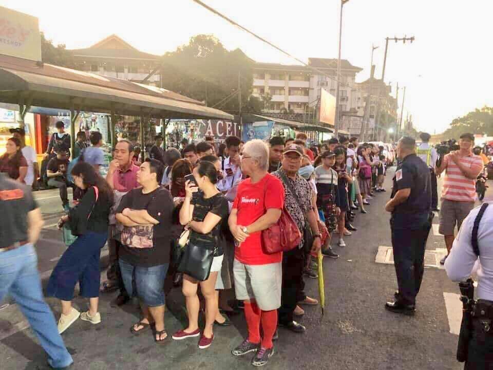 COMMUTERS who normally take the LRT2 wait for buses deployed by the MMDA and the PCG on October 7, 2019. Photo from DOTr 