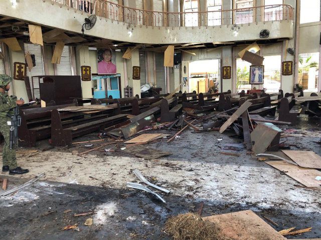 AFTERMATH. Inside the Jolo Cathedral in the aftermath of the blast. Photo from AFP Westmincom  