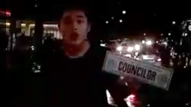 MISTAKE. An intoxicated John Apacible flaunts his "councilor" plate during a drunk driving incident. Screenshot from Facebook 